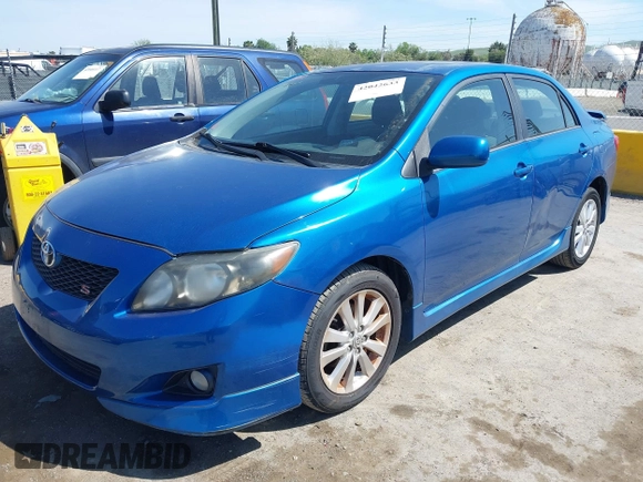 2009 Toyota Corolla with VIN 1NXBU40E49Z022648, listed as a IAAI auction lot 42042633 with 134,628 mi miles. Bid and sale history available at carsss.com. Image 2.