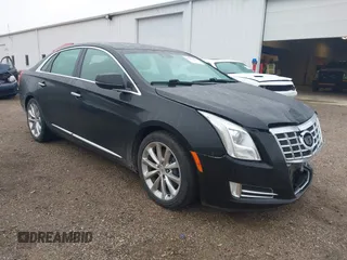 2013 Cadillac XTS Luxury with VIN 2G61P5S30D9210844, listed as a IAAI auction lot 42156443 with 125,578 mi miles and . Bid and sale history available at DreamBid. Image 1.