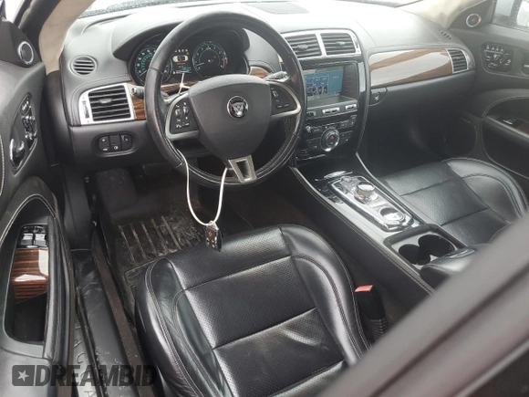 2014 Jaguar XK with VIN SAJWA4GB7ELB54429, listed as a Copart auction lot 72463344 with 72,711 mi miles and Salvage Title. Bid and sale history available at carsss.com. Image 8.