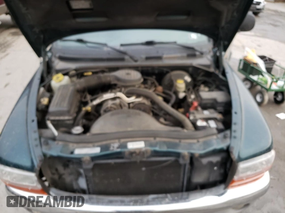 1997 Dodge Dakota z VIN 1B7GG23XXVS260724, wystawiony jako Copart lot #81040004 z przebiegiem Nie podano mil oraz Szkoda całkowita • Salvage title. Historia ofert i sprzedaży dostępna na DreamBid. Obrazek 11.