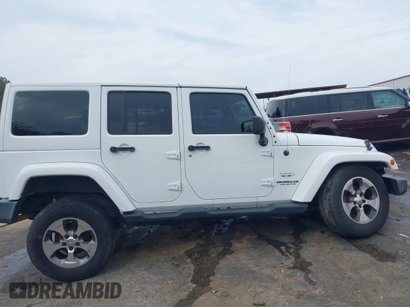 2017 Jeep Wrangler Unlimited Sahara with VIN 1C4BJWEG3HL752719, listed as a IAAI auction lot 41892600 with 127,486 mi miles. Bid and sale history available at carsss.com. Image 14.