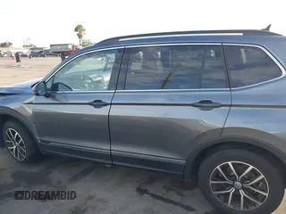 2021 Volkswagen Tiguan SE with VIN 3VV3B7AX8MM071303, listed as a IAAI auction lot 41109686 with 40,684 mi miles and . Bid and sale history available at DreamBid. Image 14.