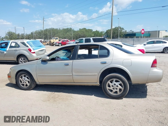 1999 Nissan Maxima GXE z VIN JN1CA21A8XT109136, wystawiony jako IAAI lot #42180758 z przebiegiem 136 876 mil mil oraz . Historia ofert i sprzedaży dostępna na DreamBid. Obrazek 13.
