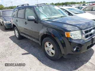 2011 Ford Escape XLT with VIN 1FMCU9D77BKA45274, listed as a IAAI auction lot 42073521 with 245,073 mi miles. Bid and sale history available at carsss.com. Image 1.