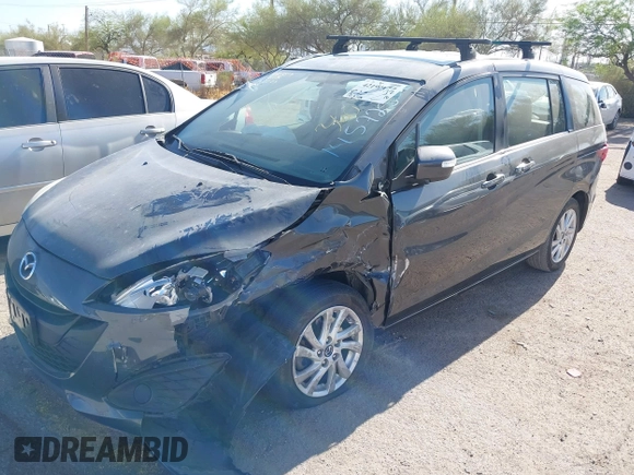 2013 Mazda 5 Sport with VIN JM1CW2BL4D0145725, listed as a IAAI auction lot 42190177 with 143,209 mi miles and . Bid and sale history available at DreamBid. Image 17.