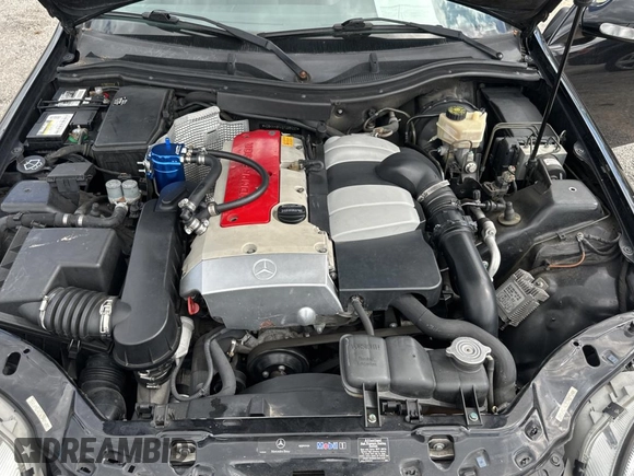 2002 Mercedes-Benz SLK 230 Kompressor with VIN WDBKK49FX2F265220, listed as a Copart auction lot 79324194 with 90,860 mi miles and Clean title. Bid and sale history available at DreamBid. Image 7.