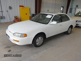 1996 Toyota Camry DX with VIN JT2BG12K3T0401659, listed as a IAAI auction lot 41874795 with 169,406 mi miles. Bid and sale history available at carsss.com. Image 2.