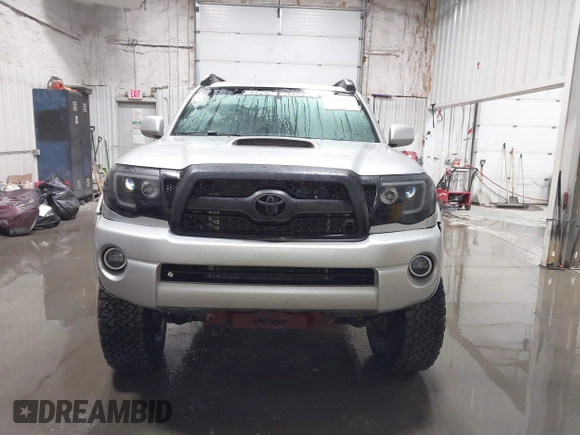 2011 Toyota Tacoma with VIN 3TMLU4EN9BM070836, listed as a IAAI auction lot 41668595 with 89,879 mi miles and . Bid and sale history available at DreamBid. Image 12.