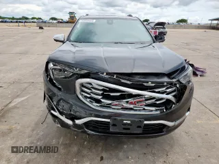 2020 GMC Terrain Denali z VIN 3GKALXEX8LL154350, wystawiony jako Copart lot #60859605 z przebiegiem 72 776 mil mil oraz Szkoda całkowita • Salvage title. Historia ofert i sprzedaży dostępna na DreamBid. Obrazek 5.
