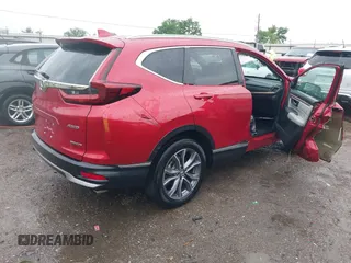 2021 Honda CR-V Touring with VIN 2HKRW2H9XMH663315, listed as a IAAI auction lot 42188893 with 26,203 mi miles and . Bid and sale history available at DreamBid. Image 4.