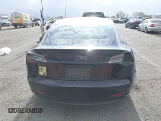 2019 Tesla Model 3 Mid Range with VIN 5YJ3E1EA3KF415601, listed as a IAAI auction lot 42125393 with 150,220 mi miles and . Bid and sale history available at carsss.com. Image 20.