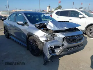 2022 Subaru WRX Premium with VIN JF1VBAF66N9031229, listed as a IAAI auction lot 42298558 with 14,084 mi miles and . Bid and sale history available at DreamBid. Image 1.