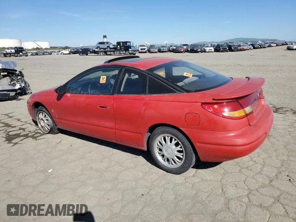 1999 Saturn SC z VIN 1G8ZY127XXZ314531, wystawiony jako Copart lot #49653805 z przebiegiem 130 457 mil mil oraz Szkody całkowita. Historia ofert i sprzedaży dostępna na DreamBid. Obrazek 2.