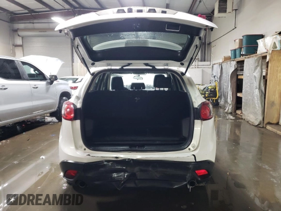 2016 Mazda CX-5 Touring with VIN JM3KE2CY7G0666474, listed as a Copart auction lot 45502575 with 162,881 mi miles and Salvage Title. Bid and sale history available at carsss.com. Image 6.