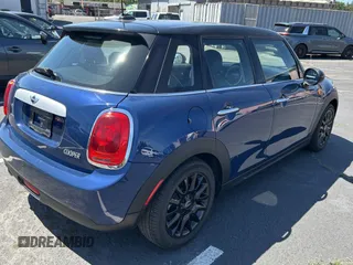 2015 MINI Hardtop 4 Door with VIN WMWXS5C5XFT831166, listed as a Copart auction lot 56714285 with 69,668 mi miles and Salvage Title. Bid and sale history available at DreamBid. Image 4.