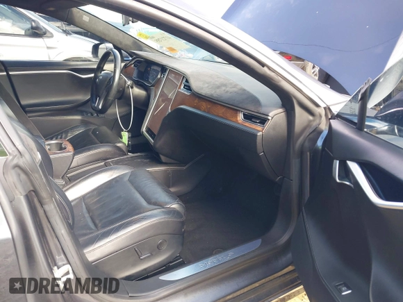 2017 Tesla Model S 100D with VIN 5YJSA1E23HF198592, listed as a IAAI auction lot 41721755 with 127,946 mi miles. Bid and sale history available at carsss.com. Image 5.