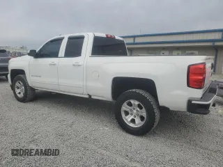 2018 Chevrolet Silverado 1500 LT with VIN 1GCVKREC7JZ176712, listed as a Copart auction lot 52084215 with 154,521 mi miles and Salvage Title. Bid and sale history available at DreamBid. Image 2.