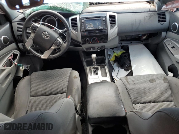 2014 Toyota Tacoma PreRunner with VIN 3TMJU4GN0EM170736, listed as a Copart auction lot 61993545 with 194,801 mi miles and Salvage title. Bid and sale history available at DreamBid. Image 8.