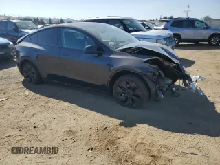 2024 Tesla Model Y with VIN 7SAYGDED0RF125308, listed as a Copart auction lot 61614675 with 11,608 mi miles and Salvage title. Bid and sale history available at DreamBid. Image 4.