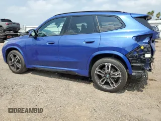 2024 BMW X1 xDrive28i with VIN WBX73EF06R5007063, listed as a Copart auction lot 56143075 with 2,947 mi miles and Salvage title. Bid and sale history available at DreamBid. Image 2.