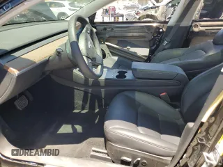 2023 Tesla Model 3 с VIN 5YJ3E1EA9PF676724, выставлен на аукционе Copart как лот 64097355 с пробегом 32 411 миль миль и Списание • Salvage title. История ставок и продаж доступна на DreamBid. Изображение 7.