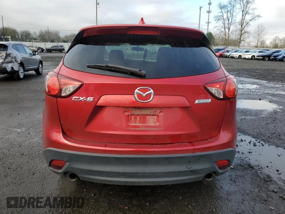 2014 Mazda CX-5 Touring с VIN JM3KE2CY3E0308740, выставлен на аукционе Copart как лот 88127365 с пробегом 137 690 миль миль и Списание • Salvage title. История ставок и продаж доступна на DreamBid. Изображение 6.