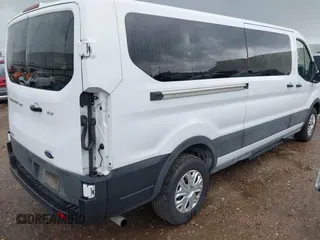 2023 Ford Transit Passenger XL with VIN 1FBAX2YG2PKA91028, listed as a IAAI auction lot 42106198 with 52,874 mi miles. Bid and sale history available at carsss.com. Image 4.