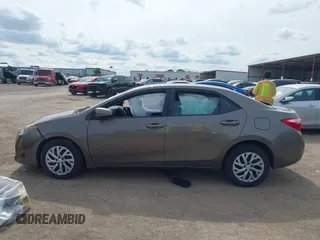2018 Toyota Corolla L with VIN 2T1BURHE1JC983389, listed as a IAAI auction lot 42221142 with 79,113 mi miles and . Bid and sale history available at DreamBid. Image 14.