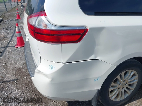 2016 Toyota Sienna XLE with VIN 5TDYK3DC4GS748888, listed as a IAAI auction lot 42605968 with 164,811 mi miles and . Bid and sale history available at DreamBid. Image 19.