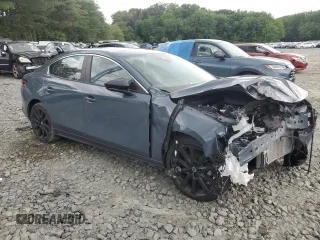 2023 Mazda 3 S Carbon Edition with VIN 3MZBPACM0PM365128, listed as a Copart auction lot 63677225 with Not provided miles and Salvage title. Bid and sale history available at DreamBid. Image 4.