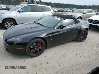 2009 Aston Martin Vantage z VIN SCFBF04CX9GD11942, wystawiony jako Copart lot #43771214 z przebiegiem 52 730 mil mil oraz . Historia ofert i sprzedaży dostępna na DreamBid. Obrazek 1.