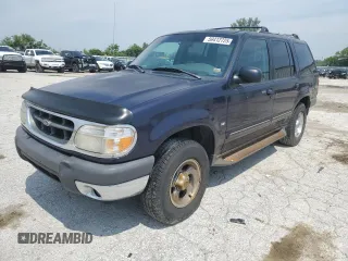 2000 Ford Explorer XLT with VIN 1FMZU83P9YZA78976, listed as a Copart auction lot 59412725 with 210,340 mi miles and Salvage title. Bid and sale history available at DreamBid. Image 1.