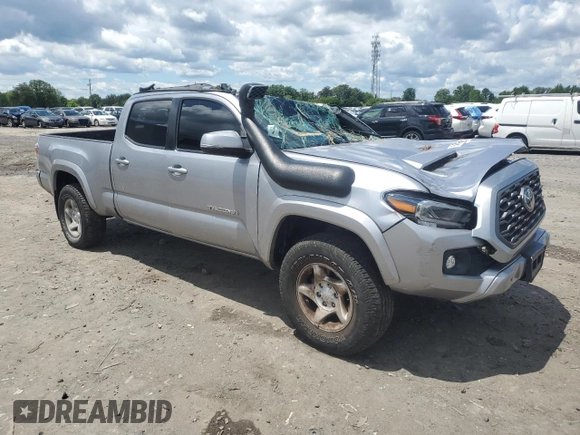 2020 Toyota Tacoma SR5 with VIN 3TMDZ5BN5LM090020, listed as a Copart auction lot 58192835 with 107,156 mi miles and Salvage title. Bid and sale history available at DreamBid. Image 4.