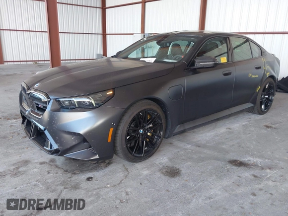 2025 BMW 5 Series with VIN WBS83FK04SCU11874, listed as a IAAI auction lot 42543784 with 4,517 mi miles and . Bid and sale history available at DreamBid. Image 19.