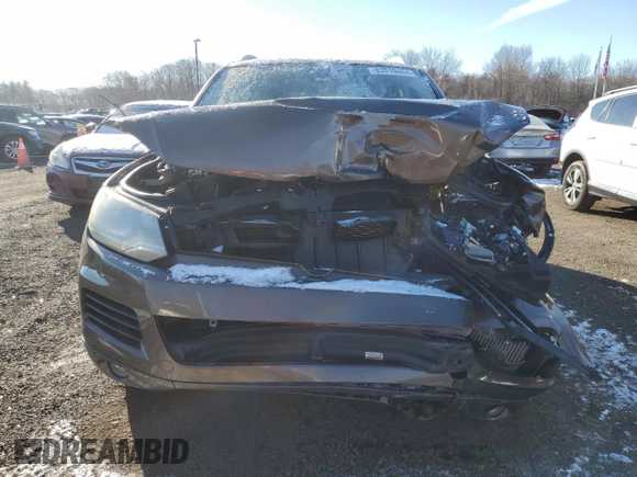 2013 Volkswagen Touareg Sport с VIN WVGEP9BP5DD003924, выставлен на аукционе Copart как лот 83310484 с пробегом Не указан миль и Списание • Salvage title. История ставок и продаж доступна на DreamBid. Изображение 5.