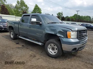 2009 GMC Sierra 2500HD Work Truck z VIN 1GTHK43K89F118521, wystawiony jako Copart lot #60003205 z przebiegiem 63 571 mil mil oraz Szkoda całkowita • Salvage title. Historia ofert i sprzedaży dostępna na DreamBid. Obrazek 4.