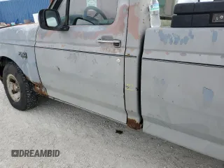 1992 Ford F-150 with VIN 1FTDF15Y2NLB00580, listed as a Copart auction lot 76871004 with 0 mi miles and Salvage Title. Bid and sale history available at carsss.com. Image 12.