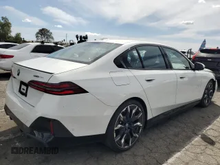 2024 BMW i5 eDrive40 with VIN WBY33FK04RCR92576, listed as a Copart auction lot 51180875 with 11,289 mi miles and Salvage title. Bid and sale history available at DreamBid. Image 3.
