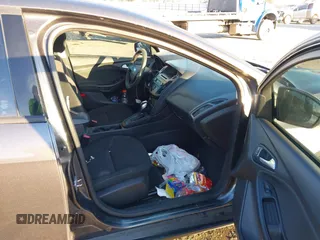 2015 Ford Focus SE with VIN 1FADP3F29FL384879, listed as a IAAI auction lot 41335839 with 107,871 mi miles. Bid and sale history available at carsss.com. Image 5.