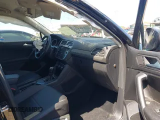 2020 Volkswagen Tiguan SE with VIN 3VV3B7AX1LM139519, listed as a IAAI auction lot 41890276 with 147,303 mi miles and . Bid and sale history available at DreamBid. Image 5.