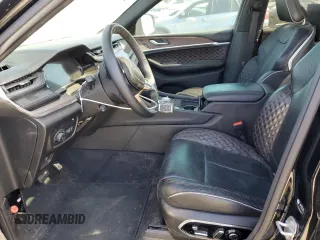 2023 Jeep Grand Cherokee Summit Reserve z VIN 1C4RJYE62PC652630, wystawiony jako Copart lot #55110525 z przebiegiem 21 186 mil mil oraz Szkoda całkowita • Salvage title. Historia ofert i sprzedaży dostępna na DreamBid. Obrazek 7.