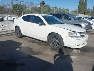 2010 Dodge Avenger SXT with VIN 1B3CC4FB6AN108889, listed as a IAAI auction lot 41049789 with 127,405 mi miles. Bid and sale history available at carsss.com. Image 1.