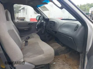 2003 Ford F-150 XL with VIN 1FTRF17203NA84217, listed as a IAAI auction lot 42324582 with 96,949 mi miles and . Bid and sale history available at DreamBid. Image 5.