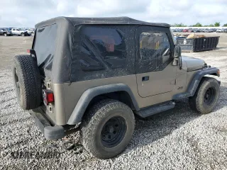 2003 Jeep Wrangler X с VIN 1J4FA39S03P349713, выставлен на аукционе Copart как лот 55768995 с пробегом 187 266 миль миль и Списание • Salvage title. История ставок и продаж доступна на DreamBid. Изображение 3.