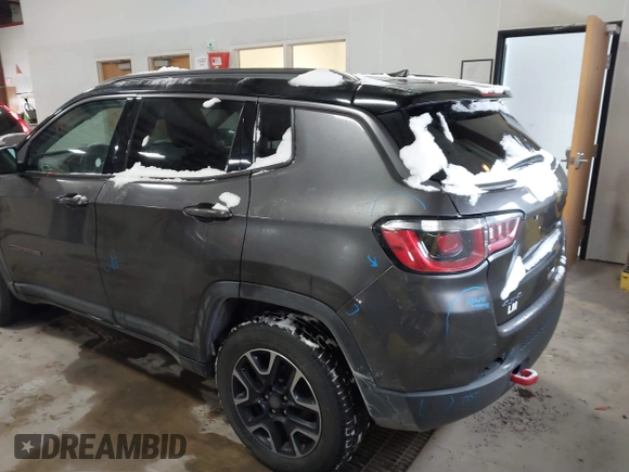 2019 Jeep Compass Trailhawk with VIN 3C4NJDDB2KT649889, listed as a IAAI auction lot 41562599 with 70,700 mi miles and . Bid and sale history available at carsss.com. Image 3.