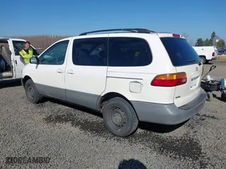 2000 Toyota Sienna LE with VIN 4T3ZF13C8YU256668, listed as a IAAI auction lot 41659040 with 387,876 mi miles. Bid and sale history available at carsss.com. Image 3.