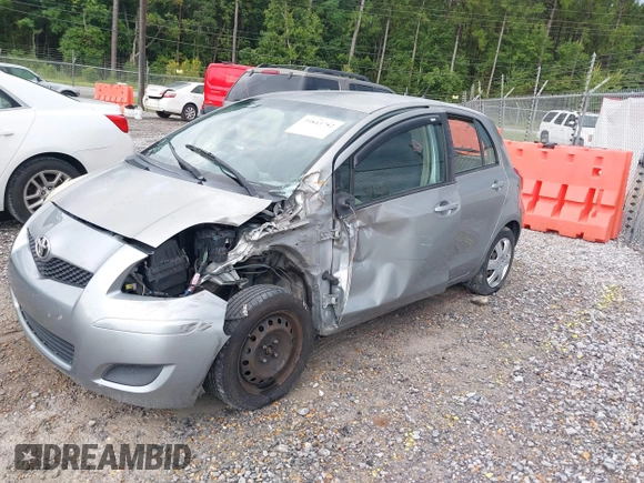 2010 Toyota Yaris with VIN JTDKT4K37A5281975, listed as a IAAI auction lot 39843782 with 257,802 mi miles. Bid and sale history available at carsss.com. Image 2.