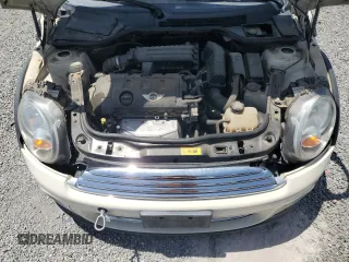 2013 MINI Hardtop z VIN WMWSU3C50DT685902, wystawiony jako Copart lot #58071935 z przebiegiem 114 908 mil mil oraz Szkoda całkowita • Salvage title. Historia ofert i sprzedaży dostępna na DreamBid. Obrazek 11.