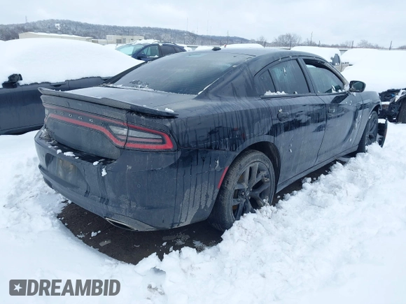 2019 Dodge Charger SXT with VIN 2C3CDXBG6KH670692, listed as a IAAI auction lot 41241415 with 173,933 mi miles. Bid and sale history available at carsss.com. Image 4.