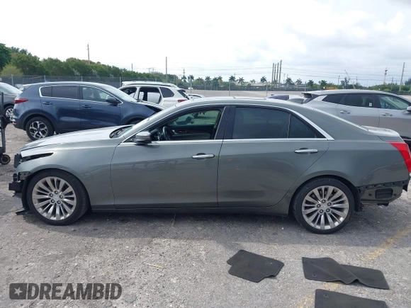 2016 Cadillac CTS Luxury Collection RWD with VIN 1G6AR5SXXG0108544, listed as a IAAI auction lot 41985630 with 86,014 mi miles and . Bid and sale history available at DreamBid. Image 15.